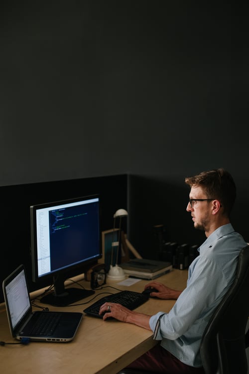 Website Developer A website/software developer busy coding in his studio